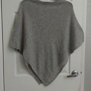 A gray cashmere poncho. One size
